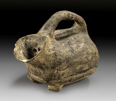 Early Greek askos, late Bronze Age. Early Greek askos with sieve in the spout in form of an 