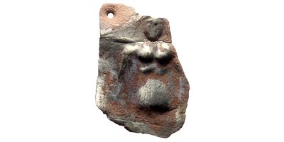 Silvered Appliqu&eacute; decorated with an embossed ornament. AE silvered (1.64g, 35x25mm) Appliqu&eacute; 