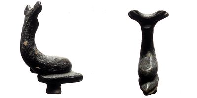 Dolpin shaped decoration. AE (16.00g, 37x18mm) Dolpin shaped decoration