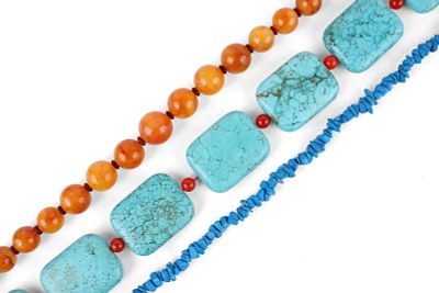 Three Women's Necklaces. Three Women's Necklaces Including a turquoise raw nugget stand, a 
