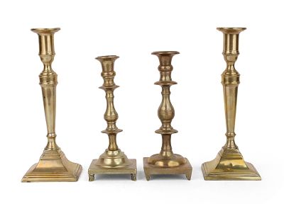 Four Brass Candlesticks. Four Brass Candlesticks All with square bases, 19th/20th C. Largest: 