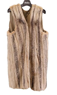Coyote Fur Long Vest. Coyote Fur Long Vest Zipper broken 38 1/2"l, 18 1/4"w across chest 