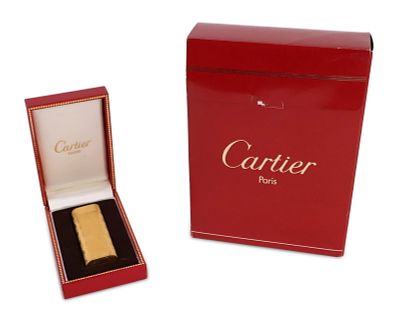 Cartier, Paris Lighter. Cartier, Paris Lighter #64059D. Together with a traveling kit with 