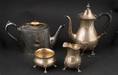 Sterling Silver Tea Set. Sterling Silver Tea Set Including a tea pot, a creamer and an open 