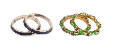 Pair of 18k and green Enamel Rings. Pair of 18k and green Enamel Rings Stamped, 18K, HM, size 