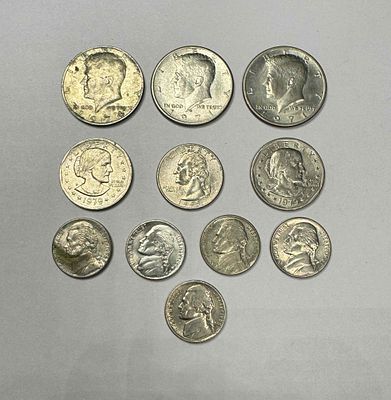 11 монет США: 1) 50 центов 1971 Президент Кеннеди Half Dollar (3шт.); 2) 1 доллар 1979 года. Р 