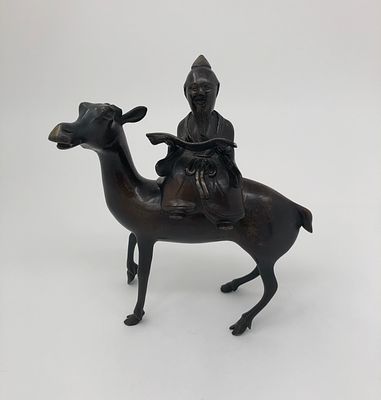 Япония. Статуэтка-шкатулка "Буддист на ослике". Буддист снимается с осла. Металл. Размер: 16 