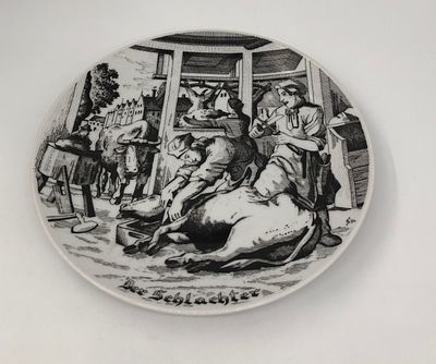 Фарфоровая декоративная тарелка "Der Schlachter". Диаметр: 24см.