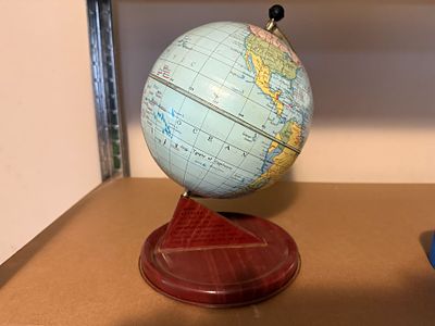 World Globe that spins. World Globe the spins on its axis; Smaller in size