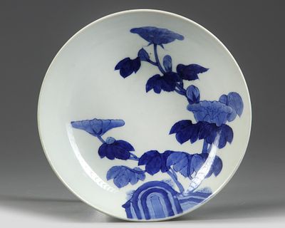 A JAPANESE NABESHIMA 'COCKSCOMB' FOOTED DISH, 19TH CENTURY. The dish is boldly decorated to the 