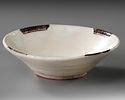 A NISHAPUR POTTERY SAMANID BOWL, 9TH-10TH CENTURY. Standing on a small uncovered foot with Image - 1