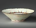A SAMANID SLIP-PAINTED POTTERY BOWL, PERSIA, 10TH CENTURY. Of conical form on a short foot Image - 1
