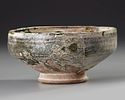 A SGRAFFITO SPLASHWARE POTTERY BOWL, PERSIA, NISHAPUR, 10TH CENTURY. A pottery bowl of rounded Image - 1