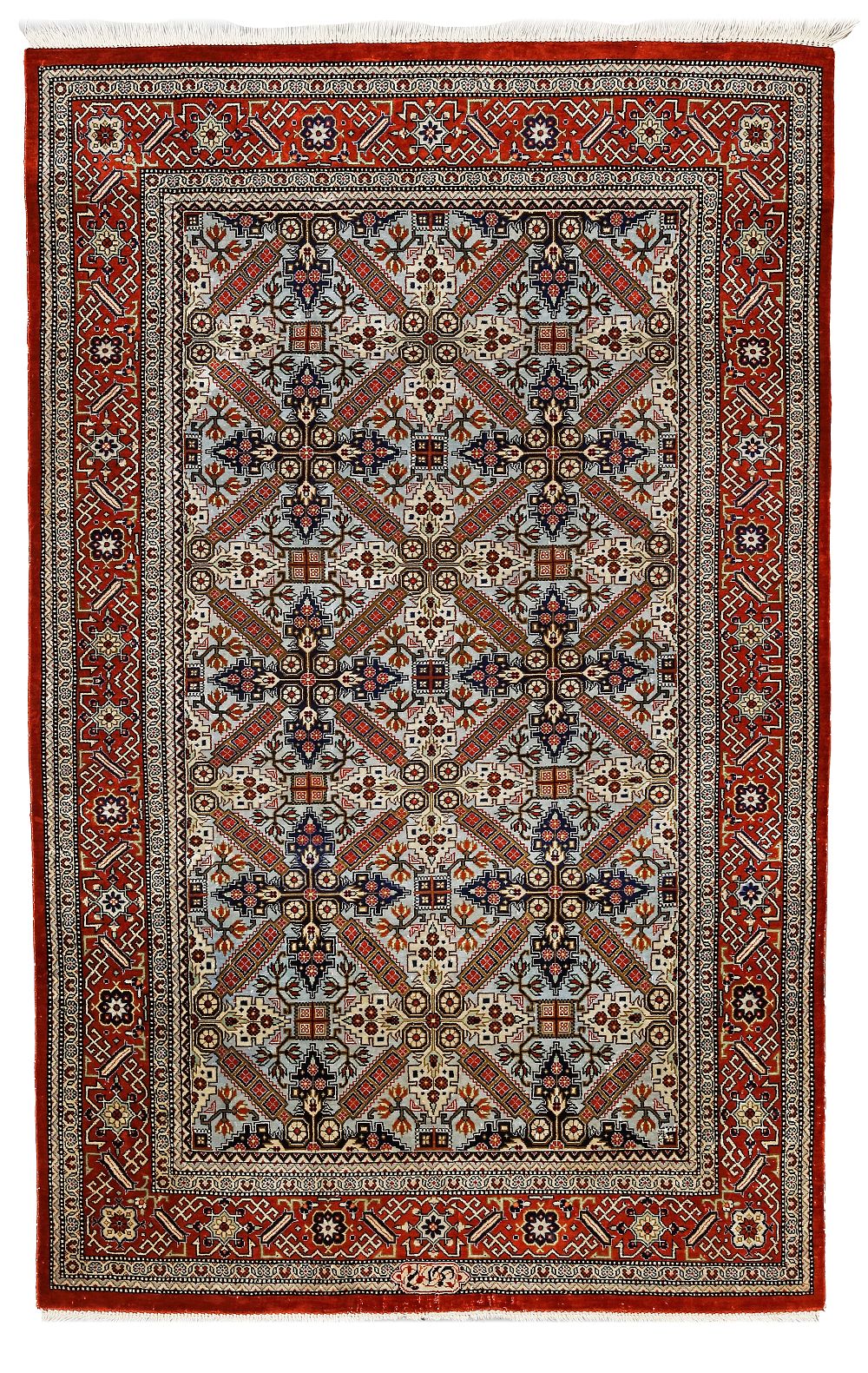 A SIGNED ANATOLIAN SILK CARPET. Signed Anatolian silk carpet, older, very finely hand-knotted 