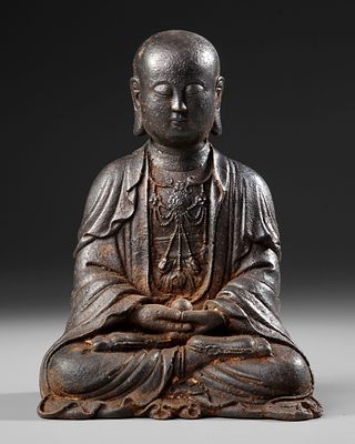 CHINESE BRONZE FIGURE, 19TH CENTURY. A finely cast Chinese bronze figure depicting a serene 