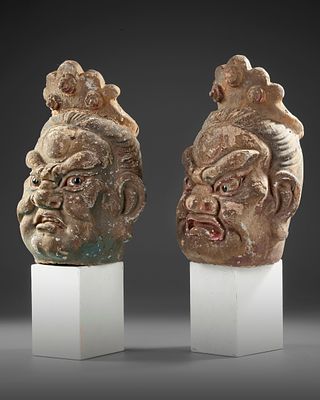 TWO CHINESE POLYCHROME WOOD HEADS, MING DYNASTY OR LATER. A pair of Chinese carved and 