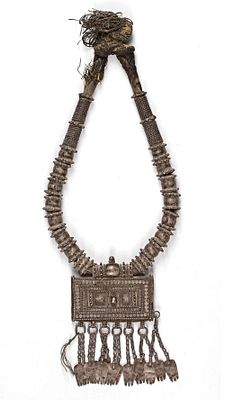 A SILVER COLLECTION NECKLACE, OMAN, 19TH CENTURY. Richly decorated with bold geometric patterns 