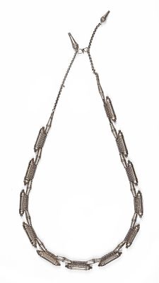 AN ISLAMIC SILVER NECKLACE, YEMEN, 19TH CENTURY. A traditional 19th-century Yemeni silver 