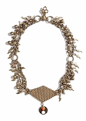 A SILVER NECKLACE, IRAQ, 20TH CENTURY. RIchly decorated with dangling bells, leaf-shaped 