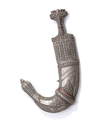 A SILVER DAGGER, SAUDI ARABIA, 19TH CENTURY. Richly decorated with intricate granulation 
