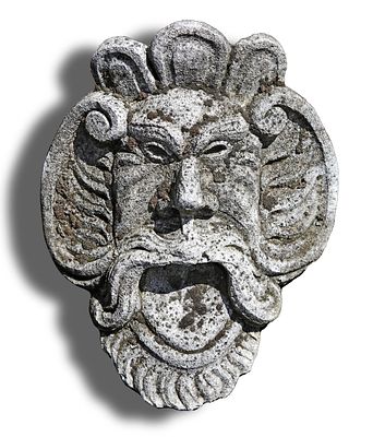 A COMPOSITION STONE FOUNTAIN MASK, SECOND HALF 20TH CENTURY. Of bearded grotesque mask form. 53 