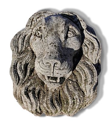 A SCULPTED CARVED LIMESTONE LION MASK WALL FOUNTAIN, SECOND HALF 20TH CENTURY. Carved in deep 