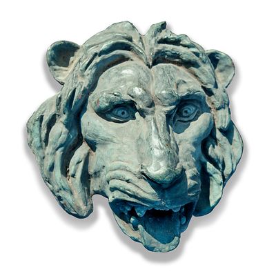A BRONZE LION’S HEAD FOUNTAIN MASK, LATE 19TH OR EARLY 20TH CENTURY. The spout formed as the 