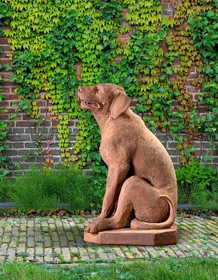 A VENETIAN TERRACOTTA MODEL OF A SEATED HOUND, 19TH CENTURY. Portrayed seated on its haunches 