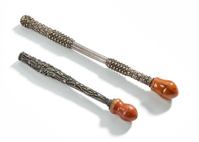 A PAIR OF OTTOMAN AMBER AND SILVER PIPES MOUTHPIECES, 19TH CENTURY. 1- 24 cm. 2- 18 cm. 162 gr.