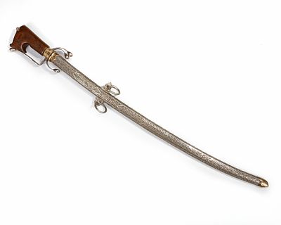 A SILVER SWORD, MOROCCO, 19TH CENTURY. A fine Moroccan sword with a wooden hilt and protective 