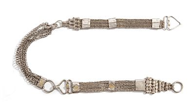 A SILVER BELT, OMAN, 19TH CENTURY. With multiple woven chain strands joined by engraved 
