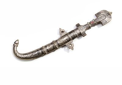 A MOROCCAN SILVER AND NIELLO DAGGER, 19TH CENTURY. With a curved blade housed in an ornate 