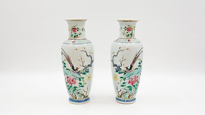 A Chinese pair Famille rose birds on branches decorated porcelain vases. A Chinese pair famille 