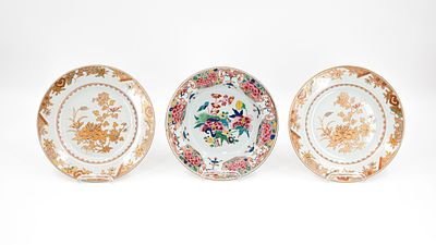 A lot of three antique Chinese Famille rose and gilt decorated porcelain plates. 18th century. 