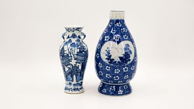 A lot of two Chinese and oriental blue and white decorated vases. Marked, 19th century. 