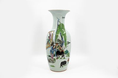 A Chinese Qianjiang and famille rose decorated porcelain vase with the decor of a garden scene. A 