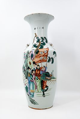 A Chinese Qianjiang and Famille Rose porcelain vase decorated with a scene of a dragon carrying 