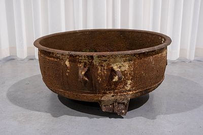 A large Chinese cast iron temple tripod incense burner with handles. Contains calligraphy and 