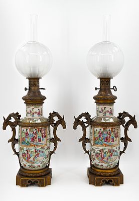 A lot of two large Chinese Canton porcelain oil-lamp vases, gilt bronze-mounted and with glass 