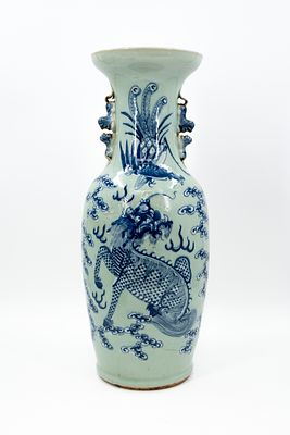 A Chinese blue and white decorated porcelain vase, decorated with a dragon and phoenix in the 