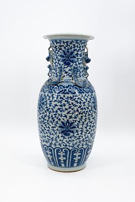 A Chinese blue and white porcelain vase decorated with lotus scrolls and garlands, with relief 