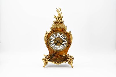 An antique French Louis XV style bronze mounted wooden cartel clock with hand painted figural 