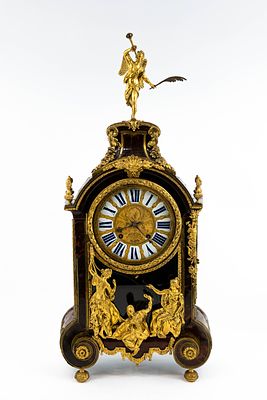 A large antique French gilt bronze mounted cartel clock on matching console by Jacques Cogniet 