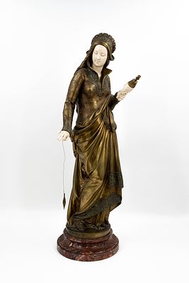 Albert Ernest CARRIER-BELLEUSSE (1824-1887) "La Fileuse". A patinated bronze sculpture. Albert 