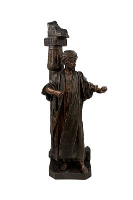 Reps & Trinte, Magdeburg, 1889-1920. A large and antique patinated terra cotta Orientalist figure. 