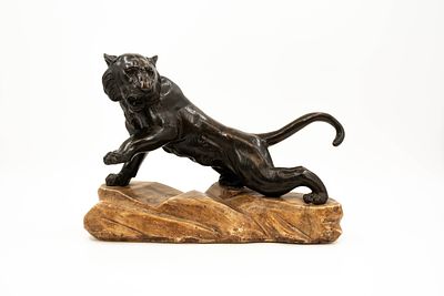 ANONYMOUS (XIX) An antique patinated bronze sculpture of a standing tiger. Mounted on an 