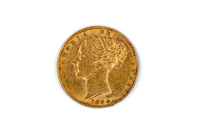A British gold coin of Victoria, dated 1884. With head of Queen Victoria on the obverse, and 