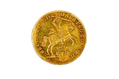 A Dutch gold 14 gulden coin of Holland, dated 1763. With armoured rider on horseback above 