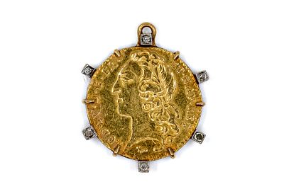 A French gold louis d'or of Louis XV, dated 1743, mounted in a pendant fitting highlighted with 