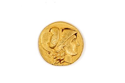 A Greek gold stater coin of Alexander III the Great, late 4th-3rd century BC. With helmeted 
